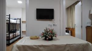 Posteľ alebo postele v izbe v ubytovaní edificio primavera zona baja