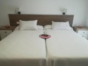 Postel nebo postele na pokoji v ubytování Hostal Soledao