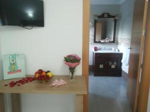TV a/nebo společenská místnost v ubytování Hostal Soledao