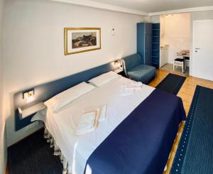 Кровать или кровати в номере Komiza Provita Guesthouse