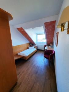 Postel nebo postele na pokoji v ubytování Hotel SunParc - SHUTTLE zum Europa-Park Rust 4km & Rulantica 2km