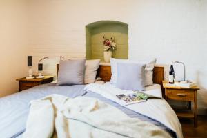 Un pat sau paturi într-o cameră la Ferienwohnung VILLA FRÜBING