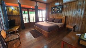 Een bed of bedden in een kamer bij Kanecha's Home