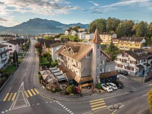 an aerial view of a town with a mountain at feRUS Hotel in Luzern