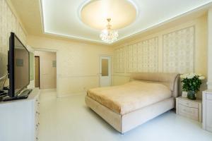 En eller flere senger på et rom på SC Apart Ostrovskogo 93d