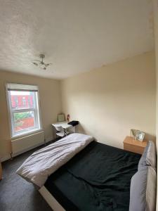 Ein Bett oder Betten in einem Zimmer der Unterkunft Radanks House - Fratton