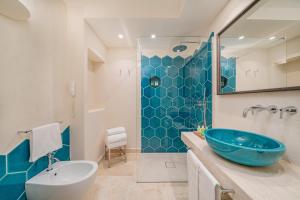 Koupelna v ubytování Hotel Cala Lunga