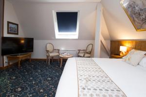 Postel nebo postele na pokoji v ubytování Hotel Eden