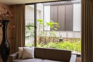 A seating area at MI YUE Boutque Motel