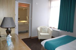 Postel nebo postele na pokoji v ubytování Hotel Eden