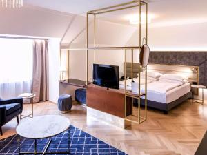 Letto o letti in una camera di Hotel Secession an der Oper