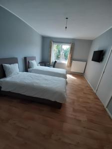 Letto o letti in una camera di Hotel Temse