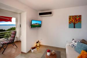TV a/nebo společenská místnost v ubytování B Apartment