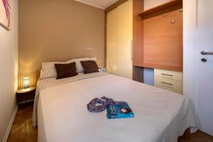 Postel nebo postele na pokoji v ubytování B Apartment