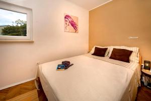 Postel nebo postele na pokoji v ubytování B Apartment
