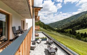 Un balcon sau o terasă la Unterlutaschg-Chalet Appartement am Hof