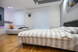 Postelja oz. postelje v sobi nastanitve MANIROSI 3 apartman