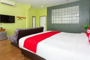 Postel nebo postele na pokoji v ubytování Yak Guesthouse