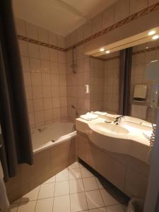 Koupelna v ubytování Hotel Eden