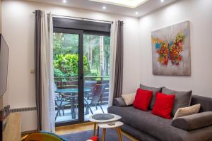 Area soggiorno di Vila Pekovic green-Apartman PAMA