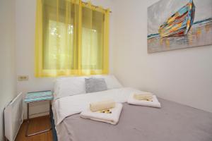 Letto o letti in una camera di Vila Pekovic green-Apartman PAMA