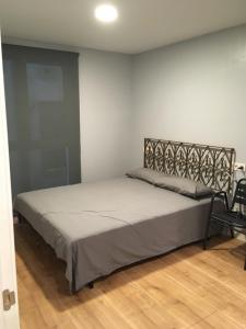 A bed or beds in a room at Studio 7calles, Casco Viejo. Bio
