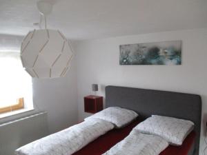 Postel nebo postele na pokoji v ubytování Ferienwohnung Rösch