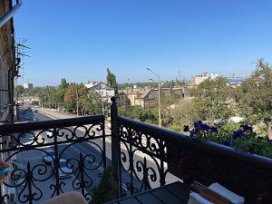 a balcony with a view of a city at Marinesko Apartments in Odesa