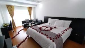 Ένα ή περισσότερα κρεβάτια σε δωμάτιο στο Hotel Palermo Suite