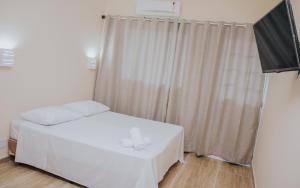 Postel nebo postele na pokoji v ubytování Pousada La Brisa