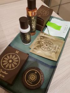 a table with three different types of products on it at Art & Jazz Hotel in Catania