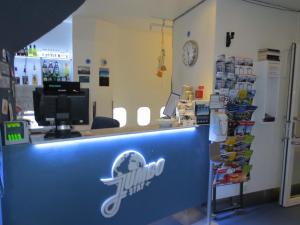 an office with a blue counter with an airplane on it at STF Jumbo Stay Stockholm in Arlanda