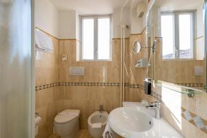 Koupelna v ubytování Hotel 4 Stagioni Sensus Spa