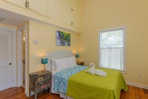 Ein Bett oder Betten in einem Zimmer der Unterkunft Key West Villas