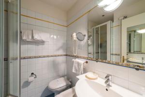 Koupelna v ubytování Hotel 4 Stagioni Sensus Spa