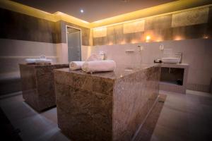 Postel nebo postele na pokoji v ubytování Hotel SPA Wieniawa