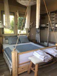 Postel nebo postele na pokoji v ubytování Istron Breeze Cocoon