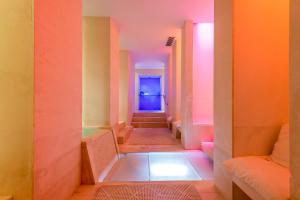 Postel nebo postele na pokoji v ubytování Hotel 4 Stagioni Sensus Spa