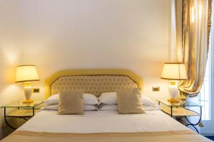 Postel nebo postele na pokoji v ubytování Hotel 4 Stagioni Sensus Spa