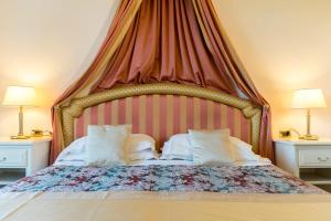Postel nebo postele na pokoji v ubytování Hotel 4 Stagioni Sensus Spa