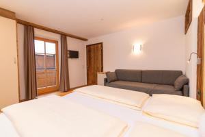 A bed or beds in a room at Sennerhof