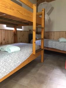 a bunk bed room with two bunk beds in it at Casa o Futuro in Alcobaça +162 photos