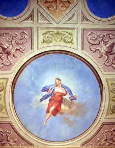 a painting of an angel on the ceiling of a room at La Luna Guest House in Florence