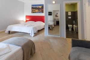 Posteľ alebo postele v izbe v ubytovaní B&B A Picture of Rome