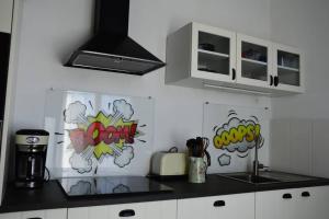 Køkken eller tekøkken på Au pied du château + 12 billeder