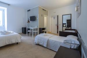 Posteľ alebo postele v izbe v ubytovaní B&B A Picture of Rome