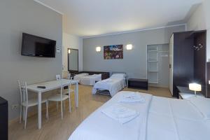 Posteľ alebo postele v izbe v ubytovaní B&B A Picture of Rome