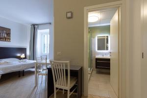 Posteľ alebo postele v izbe v ubytovaní B&B A Picture of Rome