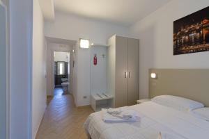 Posteľ alebo postele v izbe v ubytovaní B&B A Picture of Rome