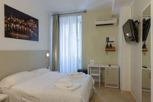 Posteľ alebo postele v izbe v ubytovaní B&B A Picture of Rome